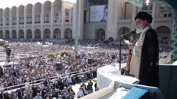 Viral Photos Show Ali Khamenei Holding Rifle In Hand While Threatening Israel During Friday Prayers Iran supreme leader Ayatollah Ali Khamenei