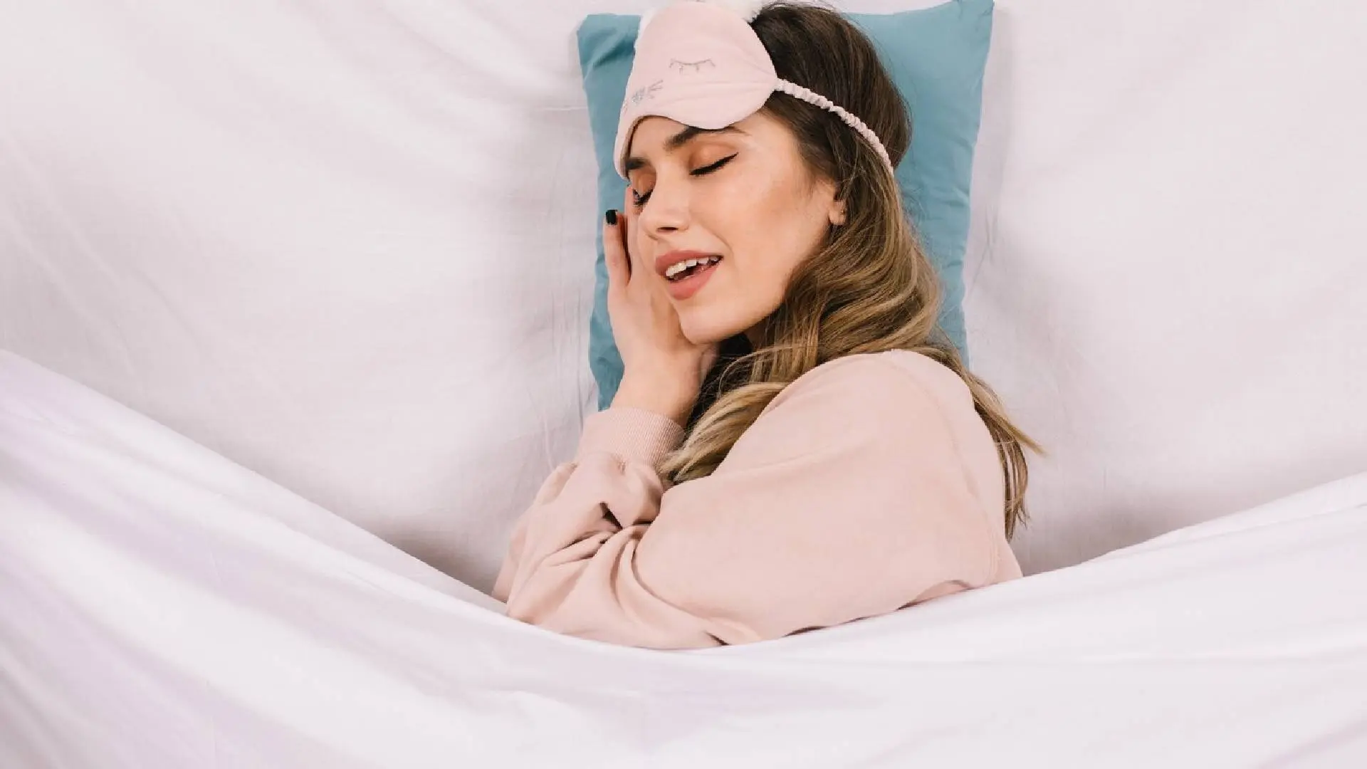 Is it okay to cover your head while sleeping