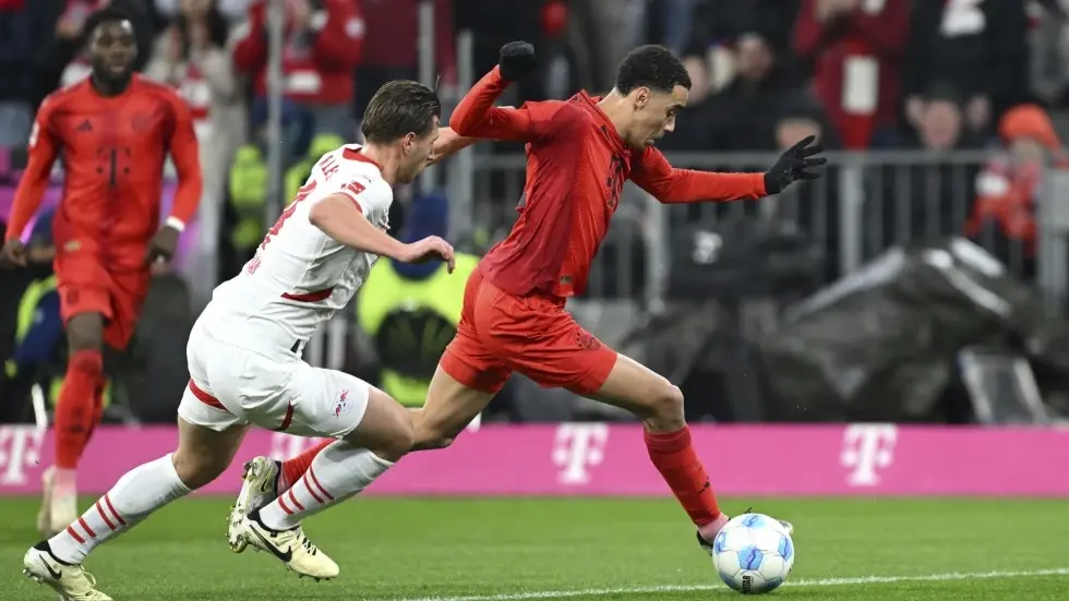 Jamal Musiala In Doubt With Illness Ahead Of Bayern Munich's First Game Of 2025 Jamal Musiala and Willi Orban