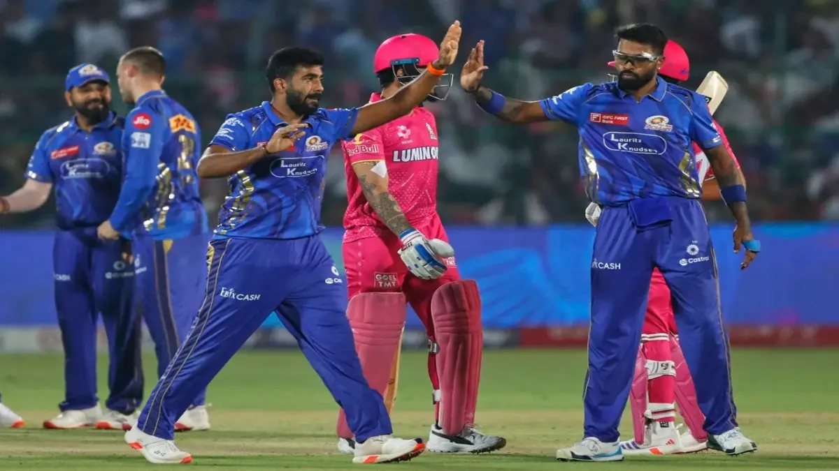 Jasprit Bumrah celebrates a wicket with Hardik Pandya