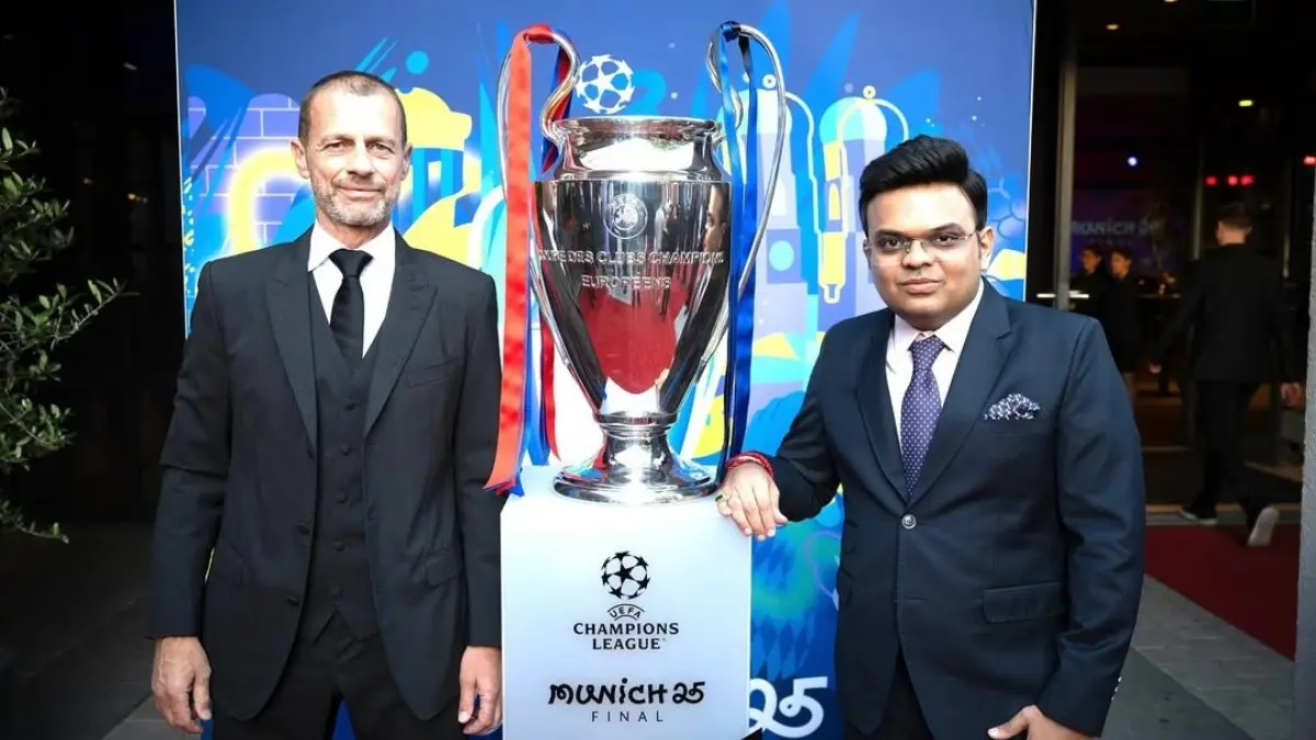 Jay Shah and Aleksander Čeferin with the UCL trophy
