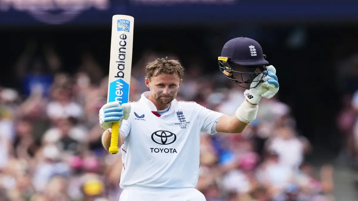 Joe Root celebrates his century
