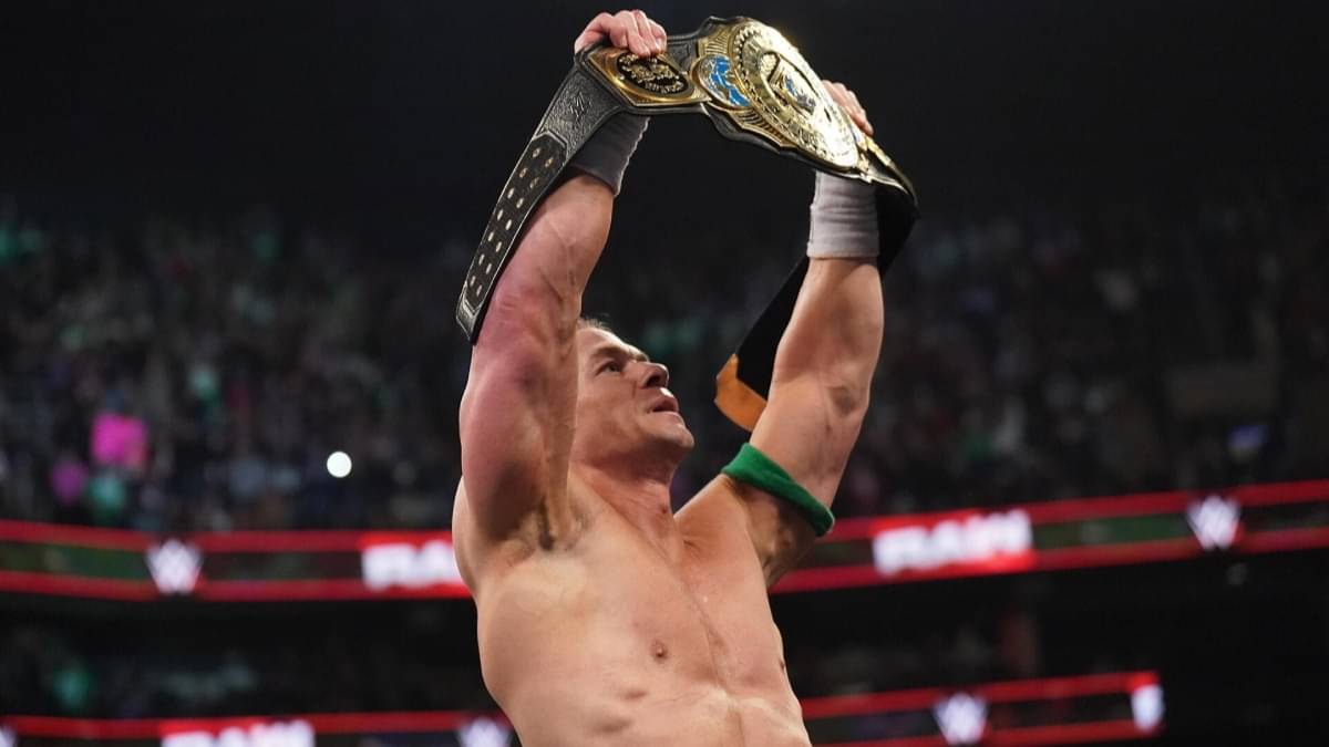 John Cena holds up his Intercontinental title