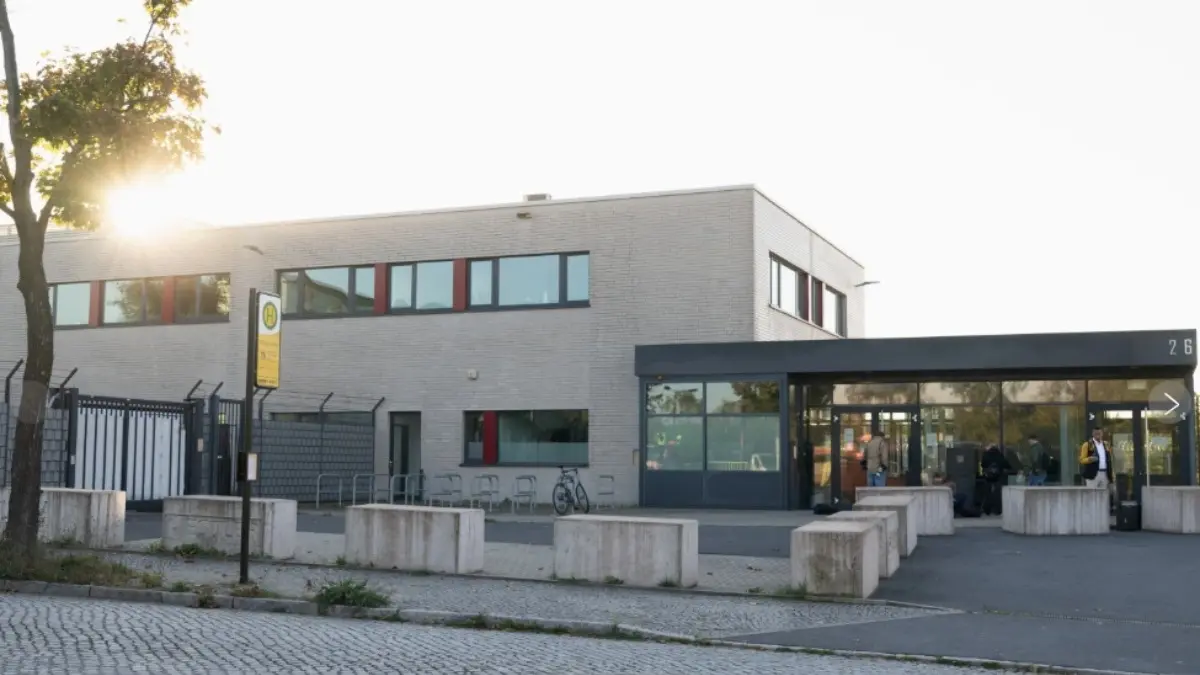 Journalists wait outside The Dresden Higher Regional Court in Dresden, Germany