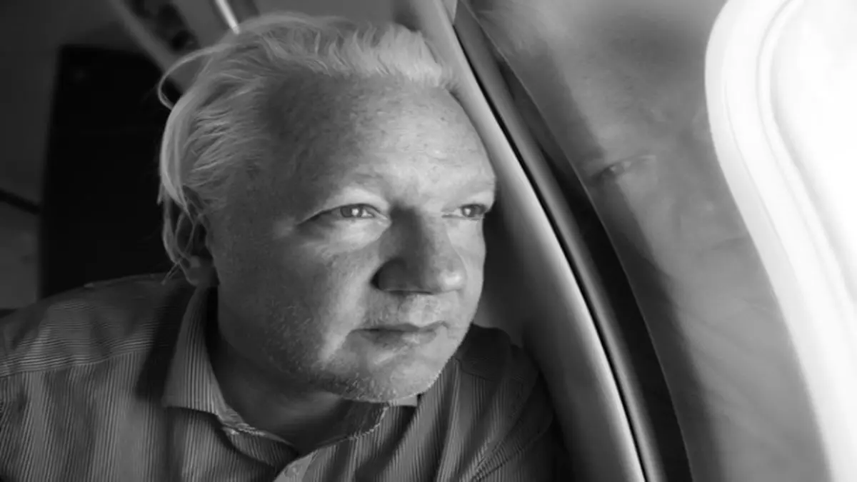 Julian Assange Lands In Sydney