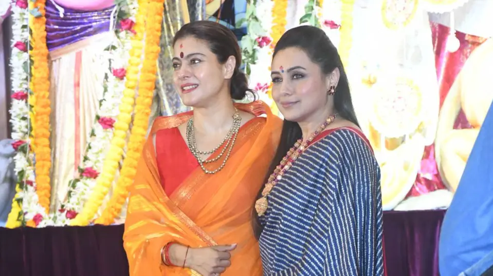 Kajol, Rani Mukerji Engage In Banter At Durga Puja Pandal In Mumbai, Video Goes Viral Kajol and Rani Mukerji posing together at Durga Puja pandal