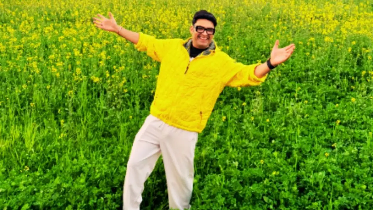 Kapil Sharma: सरसों के खेत में बाहें फैलाए कपिल शर्मा ने दिए पोज, PHOTO ने DDLJ की दिलाई याद; बदला लुक देख कंफ्यूज हुए फैंस! Kapil Sharma