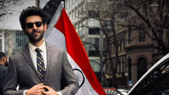 Kartik Aaryan shared a photo of himself walking on the street while in the background we can see a person holding a flag. Wishing the fans he wrote, "Bharat is not just a name; it’s a feeling that always makes our hearts swell with pride."