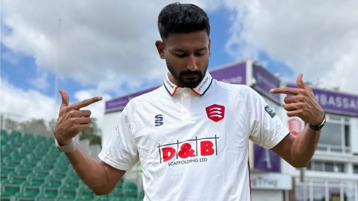 Khaleel Ahmed poses with Essex Cricket jersey