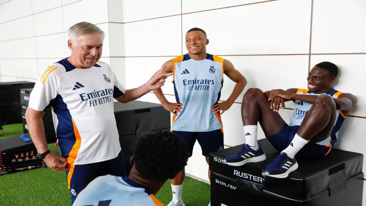 Kylian Mbappe and Carlo Ancelotti