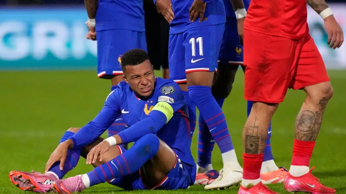 Kylian Mbappe in pain after sustaining injury during France vs Azerbaijan clash
