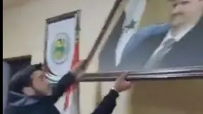 Last Moments of Assad’s Dynasty: Portrait of Bashar al-Assad Torn Down Amid Collapse of Syrian Government