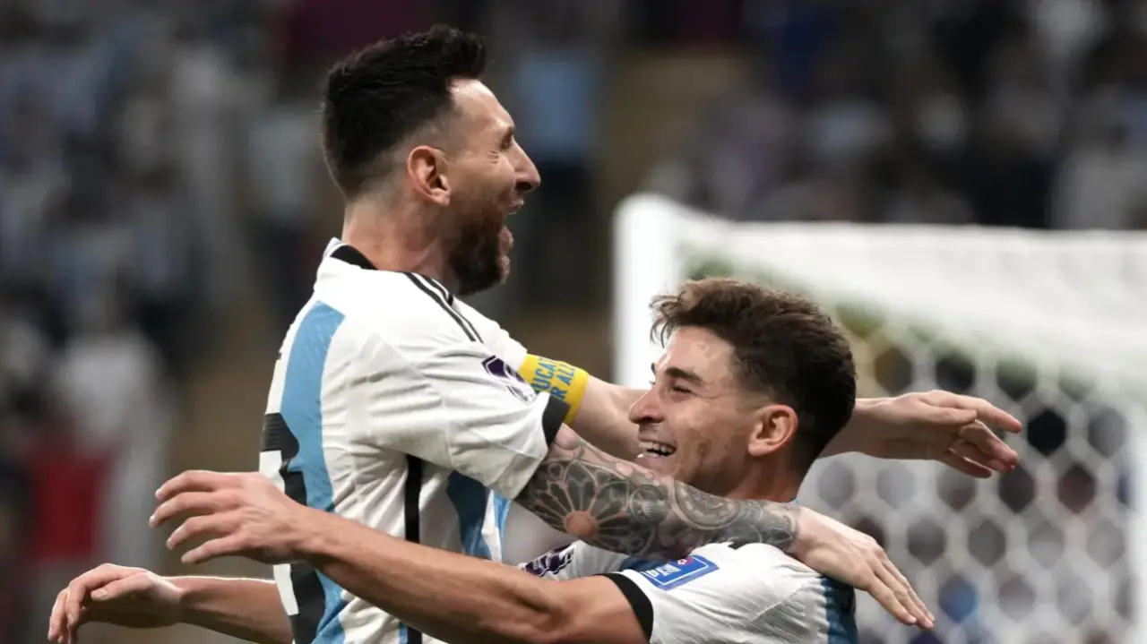 Lionel Messi and Julian Alvarez