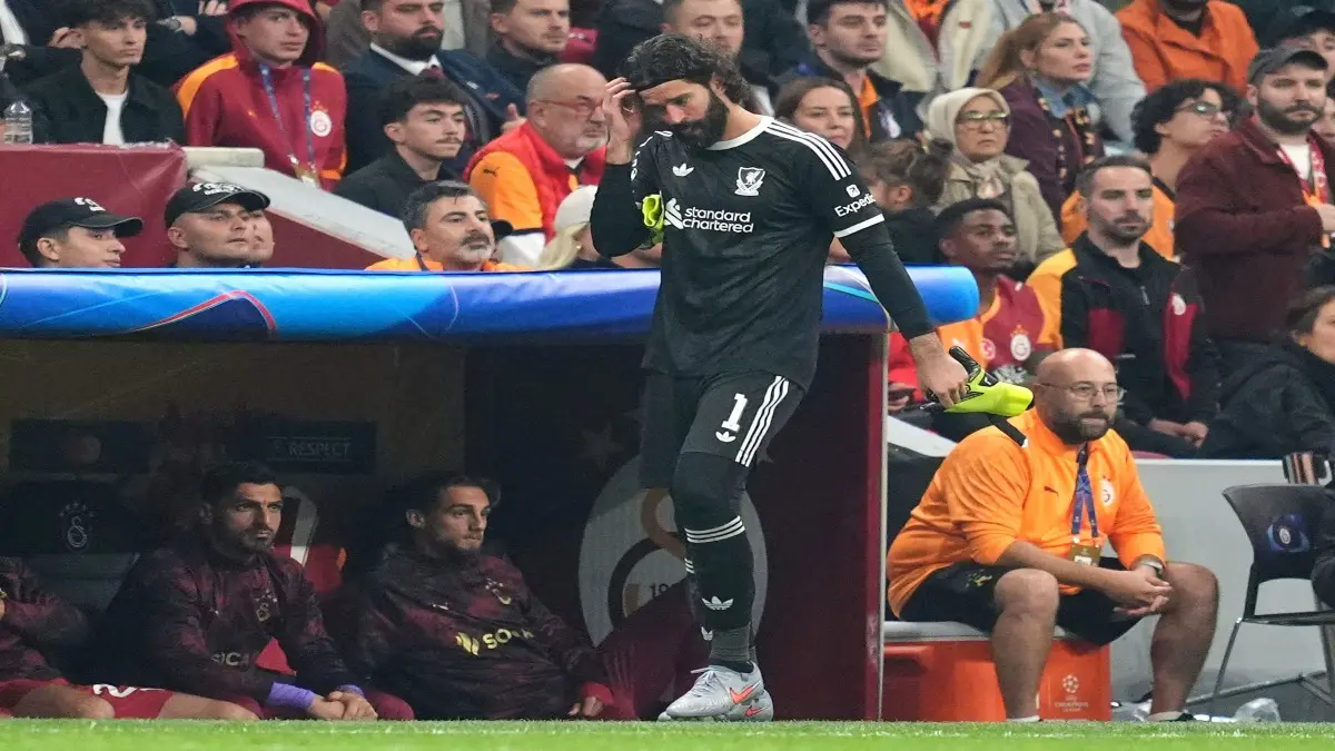 More Worrying News For Liverpool After Champions League Defeat, Arne Slot Provides Alisson And Hugo Ekitike Injury Update Ahead Of Chelsea Clash Liverpool goalkeeper Alisson Becker leaves the pitch