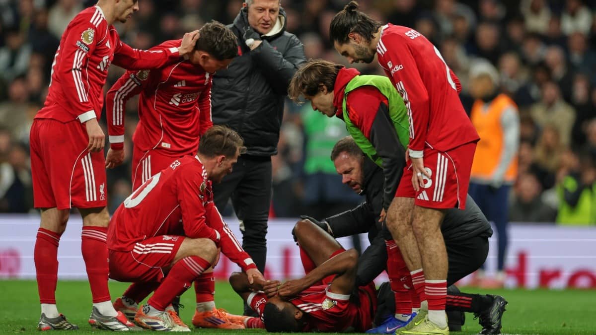 Liverpool's Alexander Isak reacts after sustaining an injury during the Premier League soccer match against Tottenham Hotspur