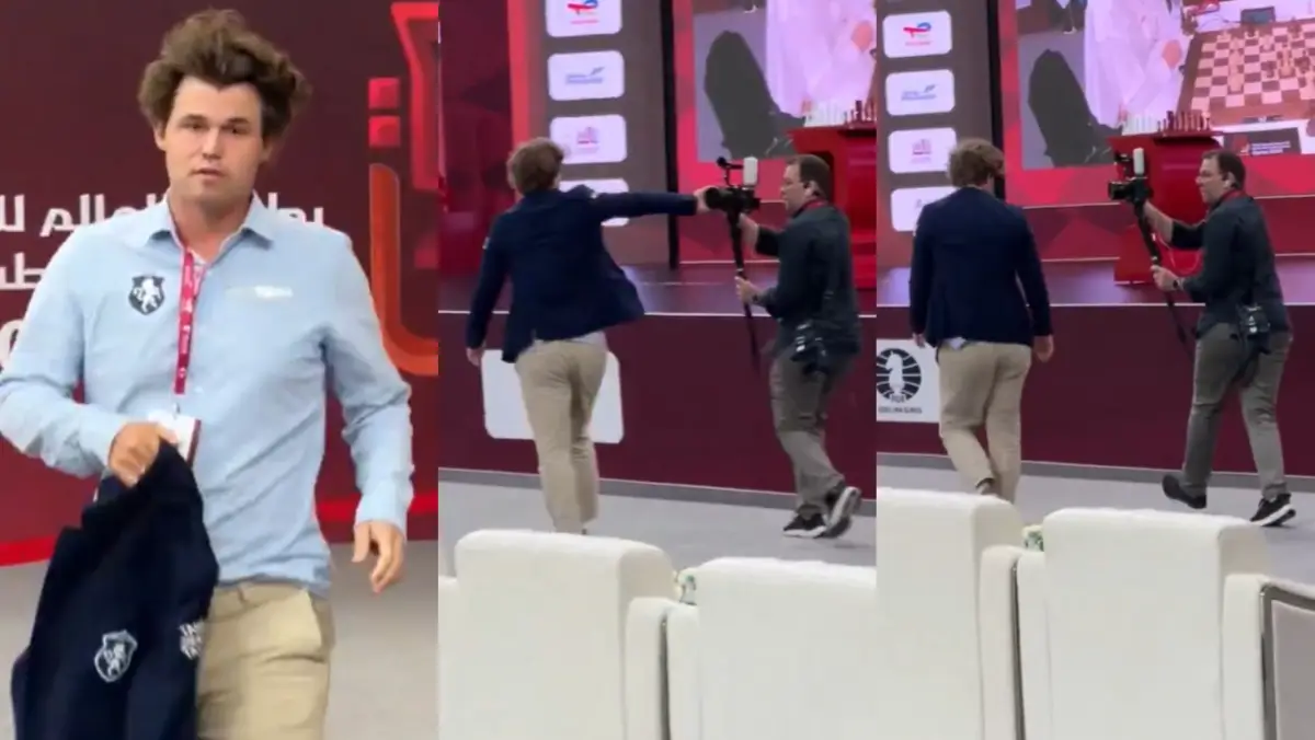 Magnus Carlsen pushes cameraman away