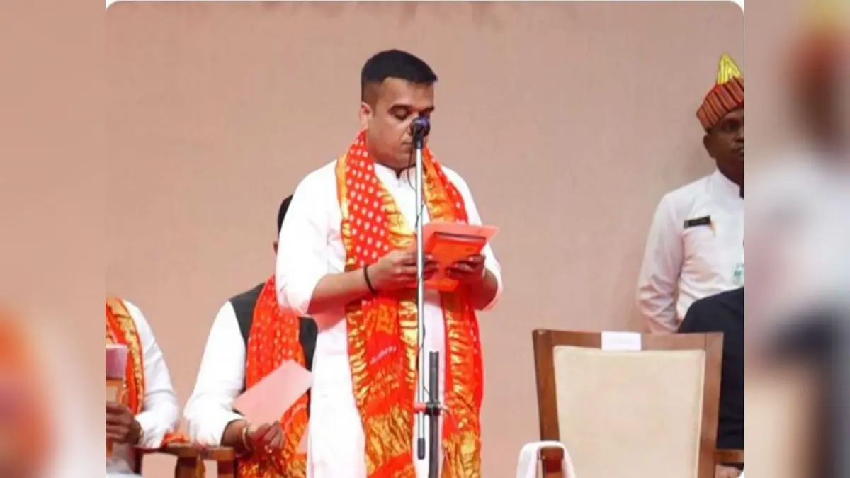 Majura MLA Harsh Sanghavi takes oath as the Deputy Chief Minister in Gujarat on Friday.