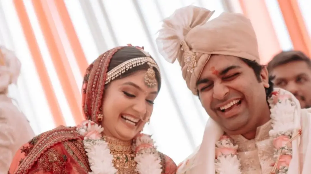 Malhar Thakar and Puja joshi at their wedding.