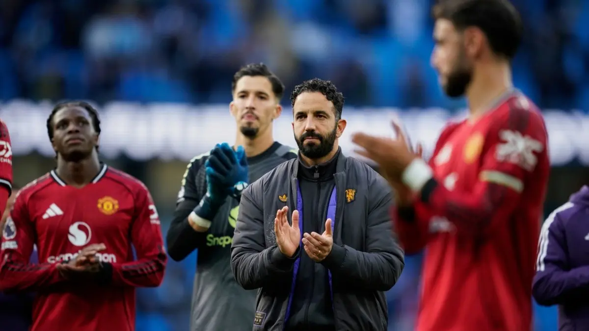 Premier League: Manchester United Handed Two Major Injury Boosts Ahead Of Key Chelsea Clash On Saturday Manchester United's head coach Ruben Amorim and players walk off the pitch after defeat against Manchester City in the derby