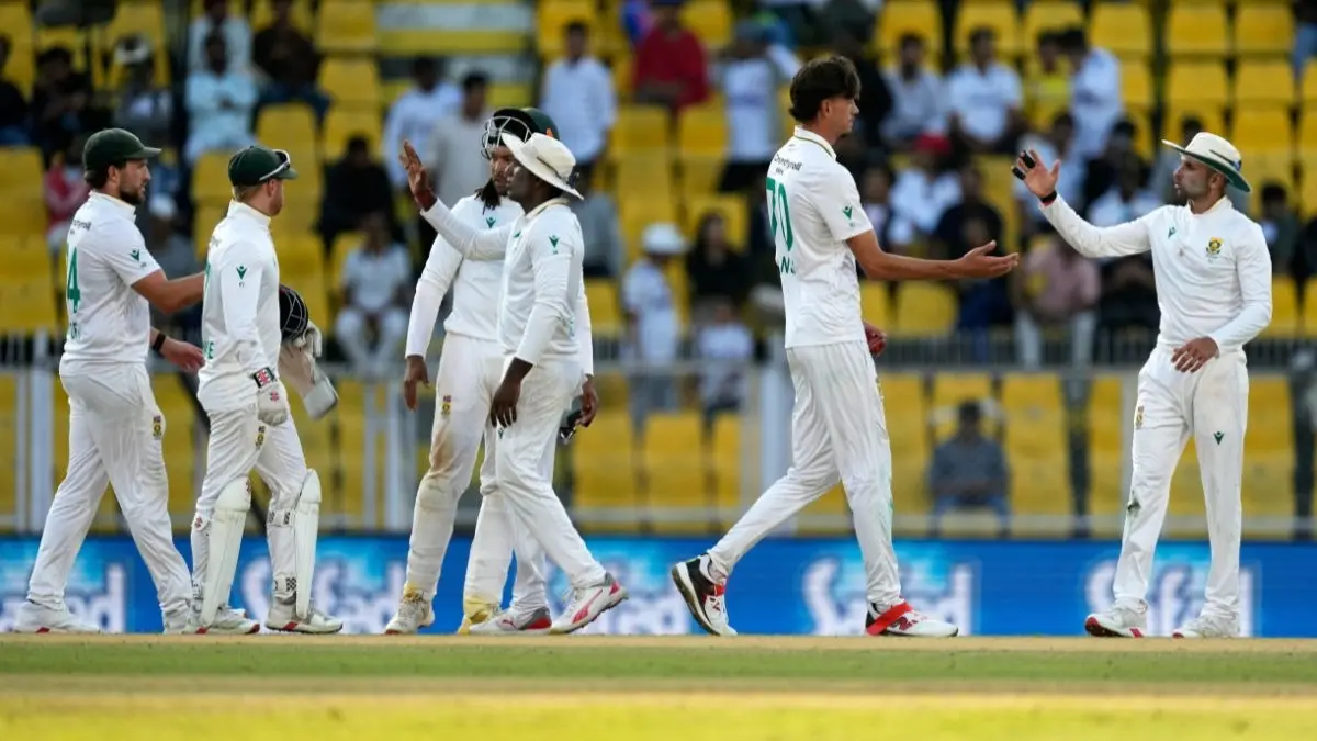Marco Jansen celebrates with teammates after the dismissal of India's Mohammed Siraj