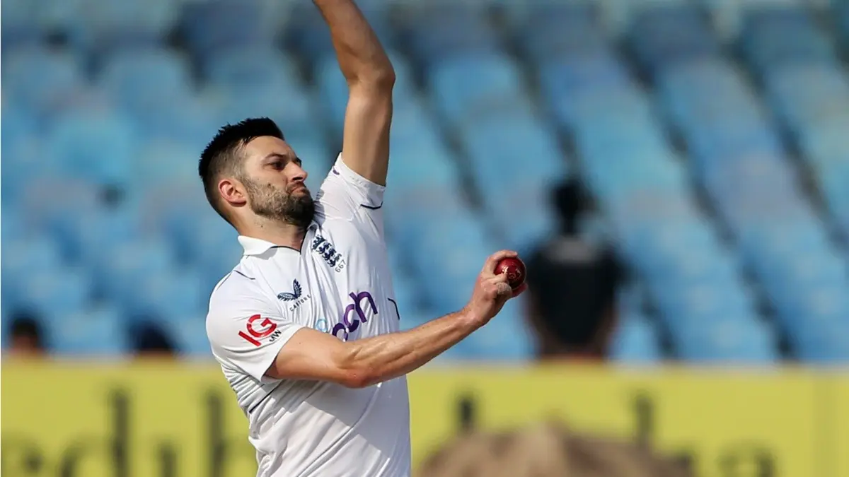 Mark Wood in action during the Rajkot Test between India and England in 2024.