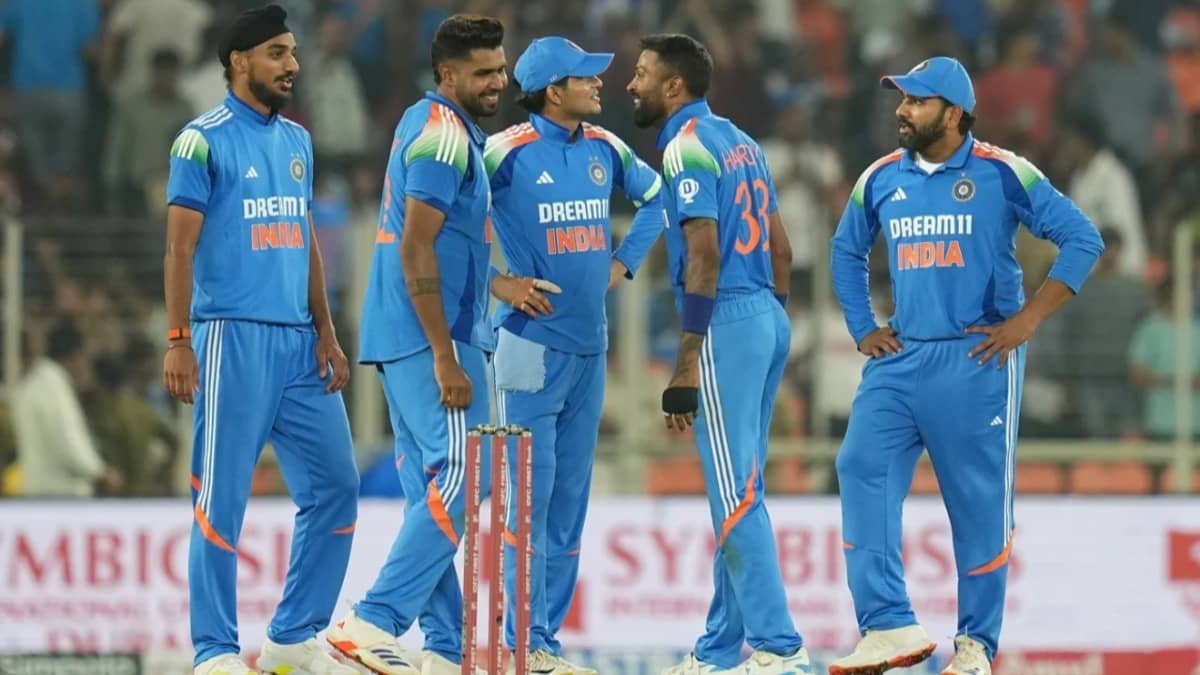 Members of Indian cricket team celebrate fall of wicket