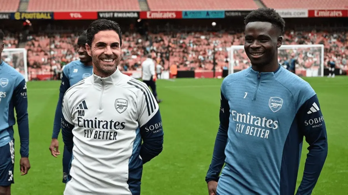 Mikel Arteta and Bukayo Saka