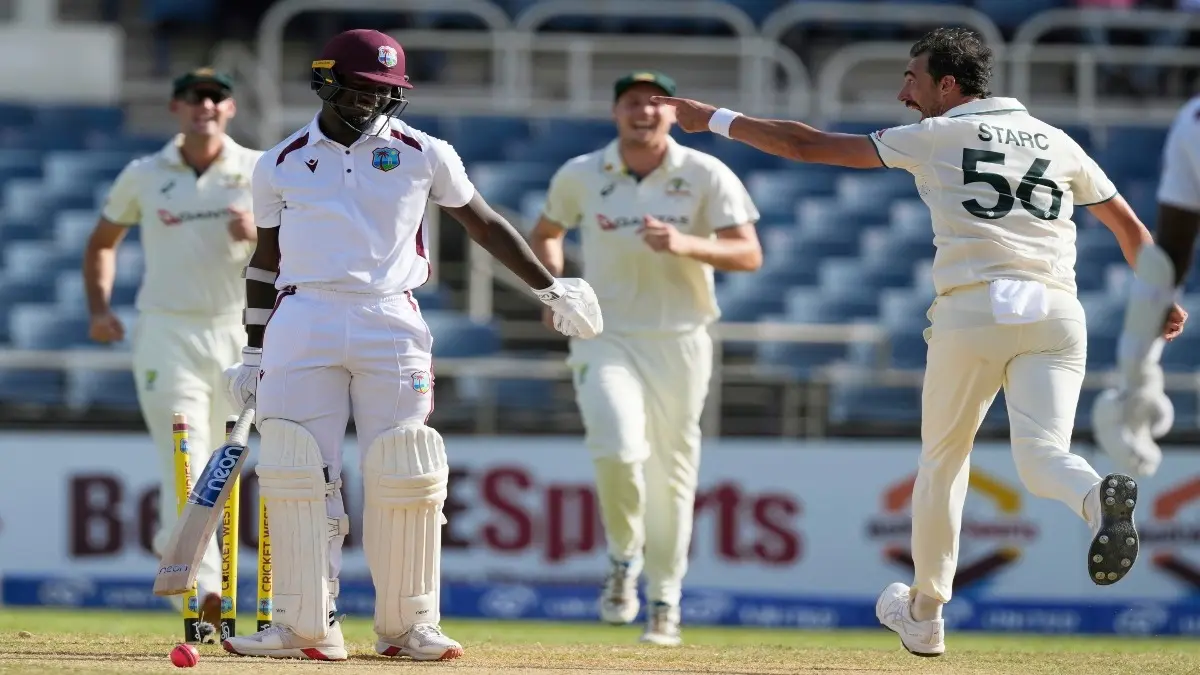Mitchell Starc celebrates the wicket of Jayden Seales