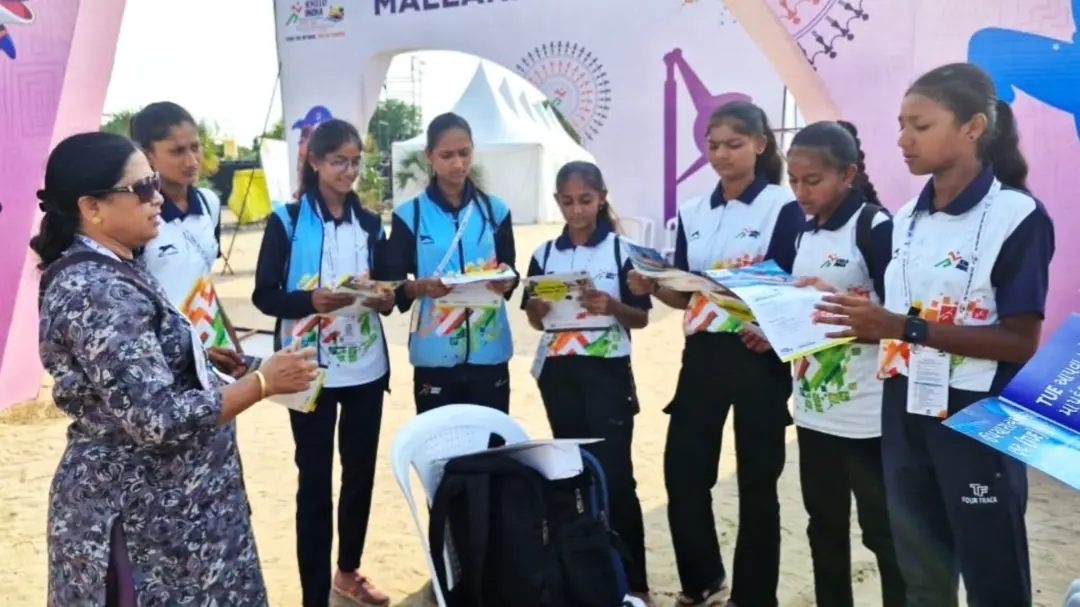Usha Subhash Nikumbh distribute pamphlets to bring awareness among atheletes taking part in 2025 Khelo India Beach Games