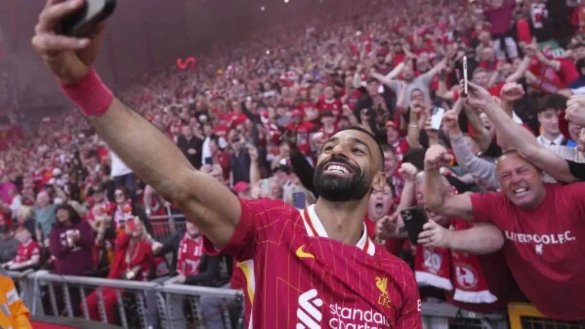 'Powerful Enough To Move The Earth': Liverpool's Premier League Title Win Causes 1.74 Magnitude Seismic Activity Mohammed Salah celebrates with the fans.