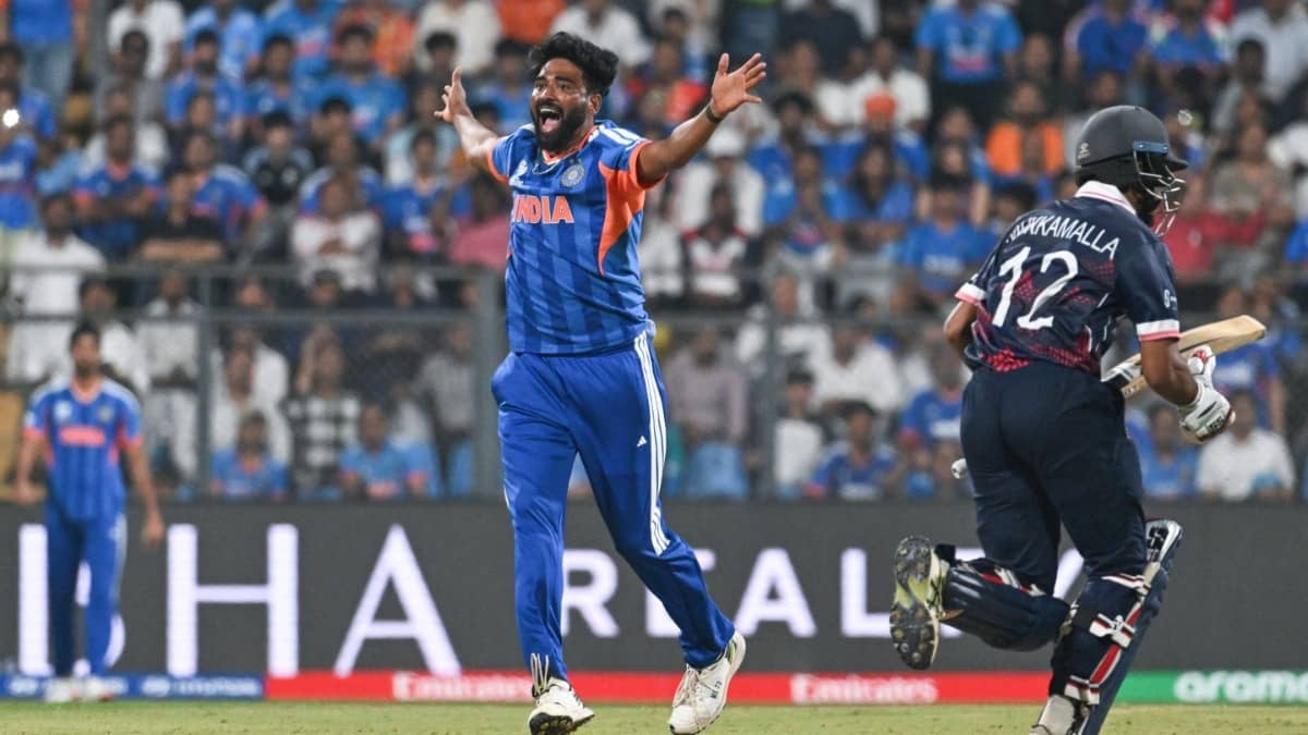 Mohammed Siraj celebrating after taking a wicket against USA