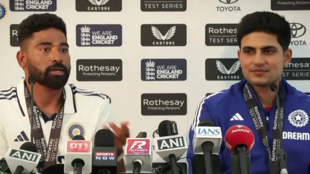 Mohammed Siraj (L), Shubman Gill (R)