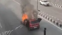 Moving Car Catches Fire Near Dwarka Underpass in Delhi, Traffic Disrupted | Video