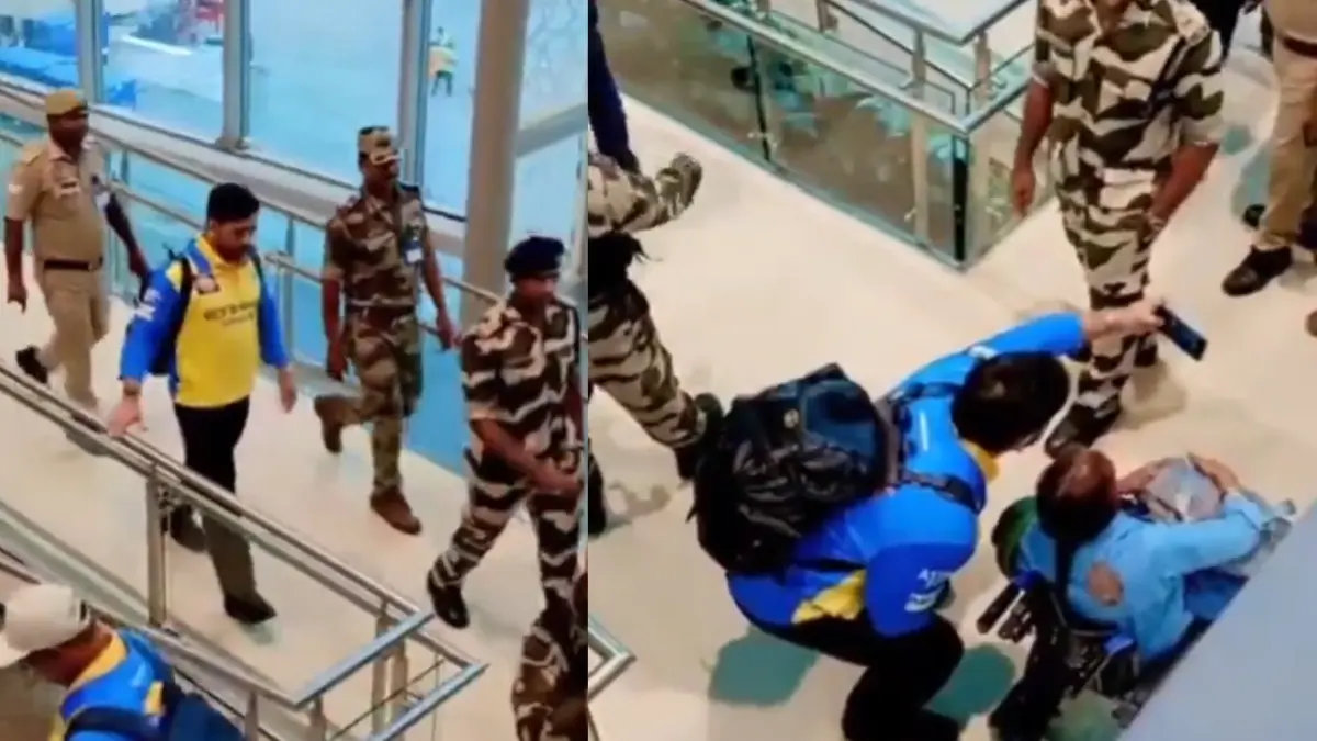 MS Dhoni clickjs picture with wheelchair-bound fan