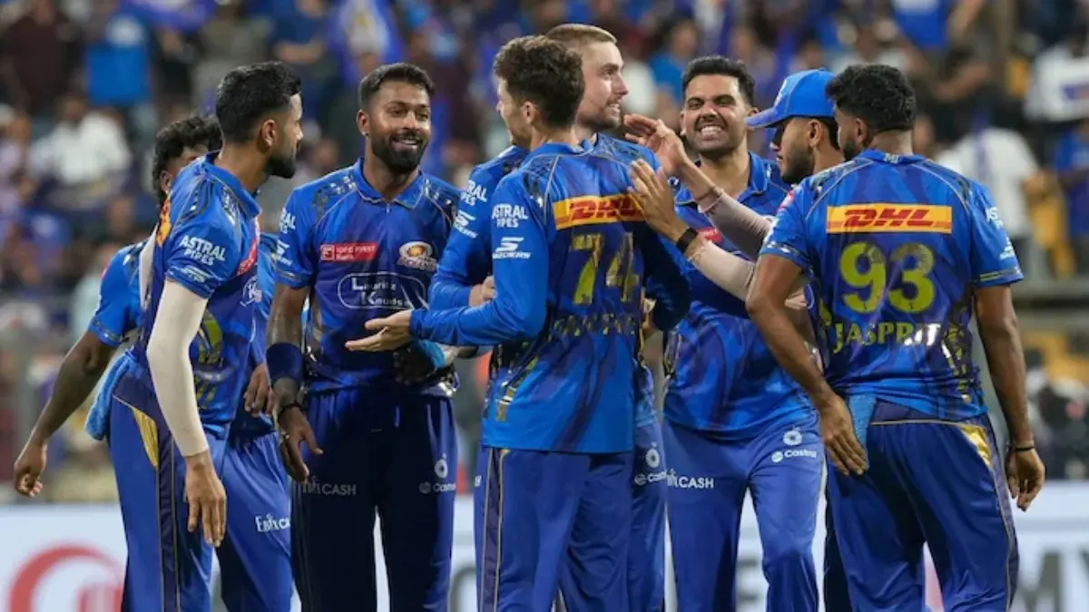 Mumbai Indians celebrate a wicket.