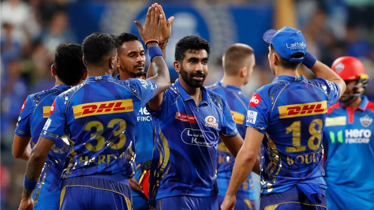 Mumbai Indians fast bowler Jasprit Bumrah celebrates a wicket with his teammates during the IPL 2025 clash against Delhi Capitals