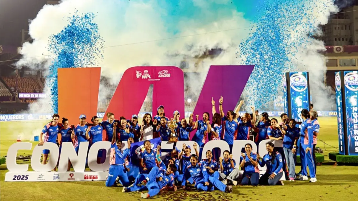 Mumbai Indians players celebrate after winning the Women's Premier League 2025, at Brabourne Stadium