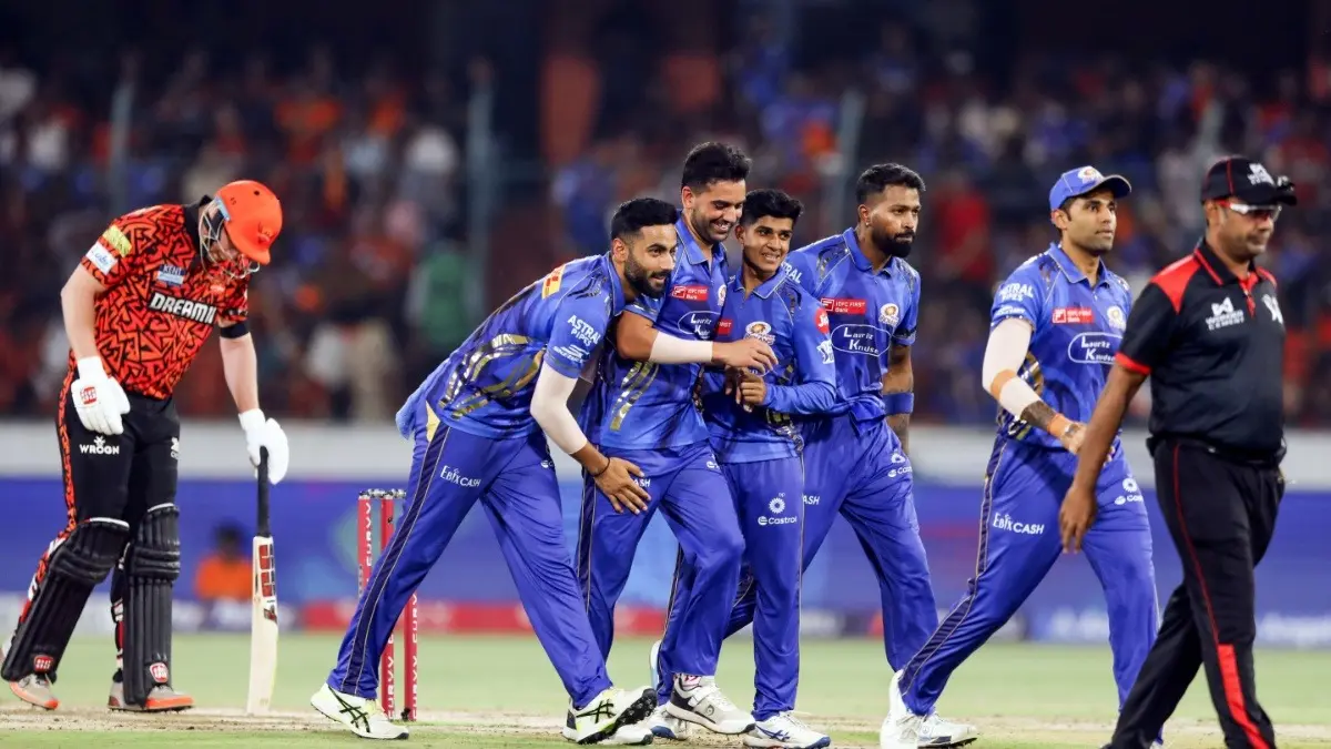 Mumbai Indians players celebrate Nitish Kumar Reddy's wicket