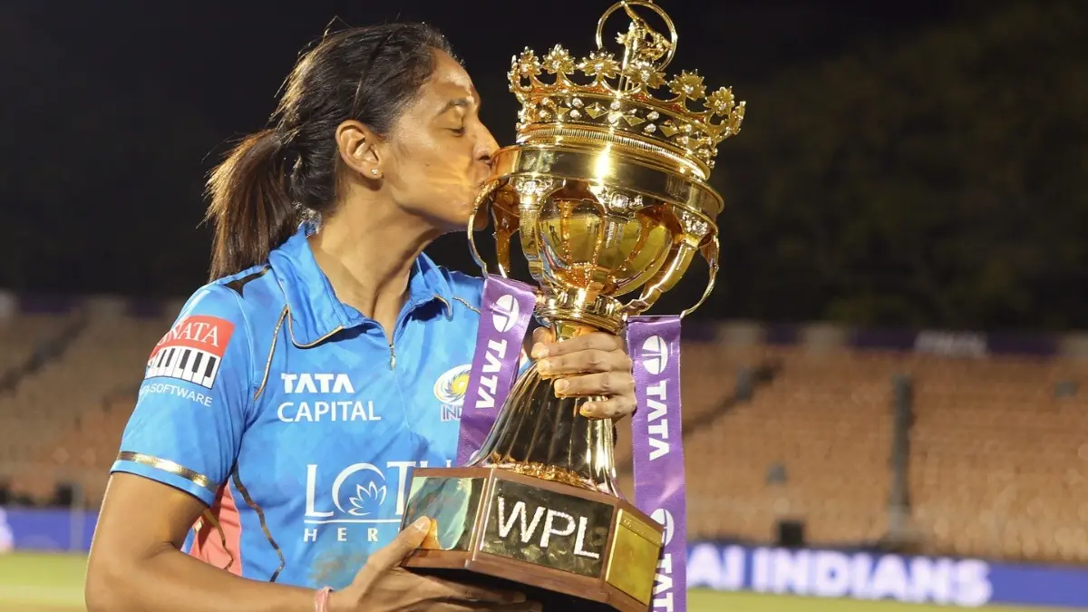 Days After Winning Women's World Cup 2025, Harmanpreet Kaur Named Among Five Retained Players For Mumbai Indians Ahead Of WPL 2026 Auction Mumbai Indians skipper Harmanpreet Kaur with WPL 2023 title