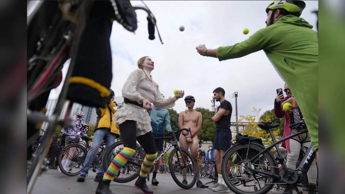 Naked bike riders demonstrate against federal troops in 'quintessentially Portland' protest