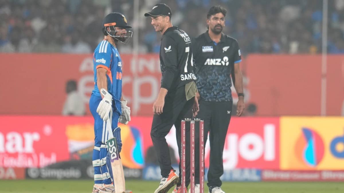 New Zealand's captain Mitchel Santner looks at India's Rinku Singh during the 4th T20I match