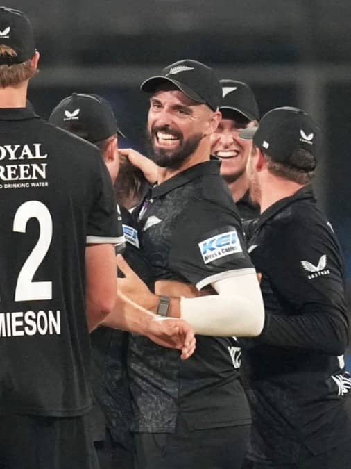 New Zealand's players celebrate after winning the 3rd ODI match against India in Indore