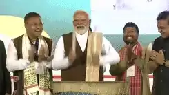 PM Modi Beats Traditional Drum At Jhumoir Binandini Event In Guwahati | VIDEO