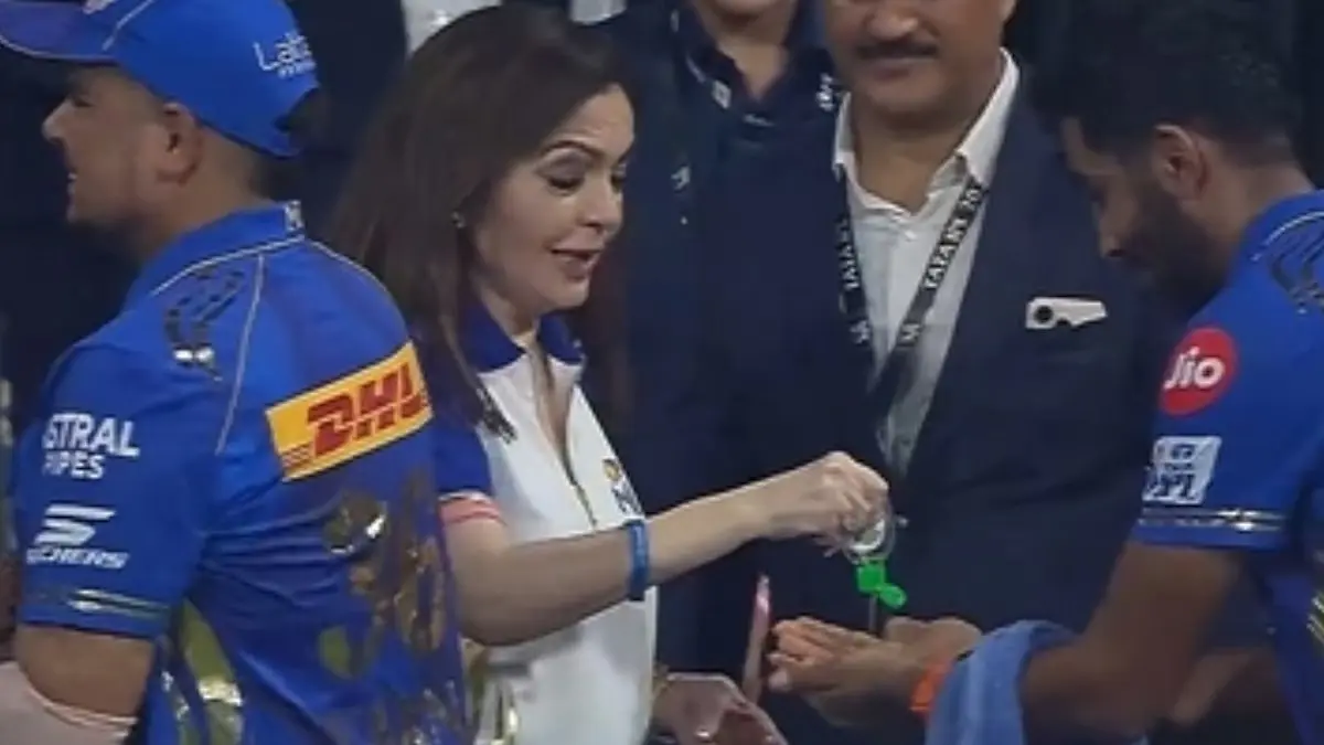 Nita Ambani sanitises Jasprit Bumrah's palm