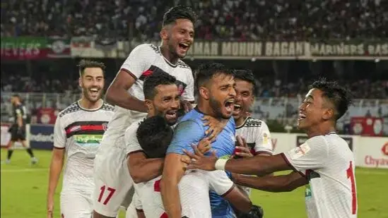 NorthEast United players celebrate.