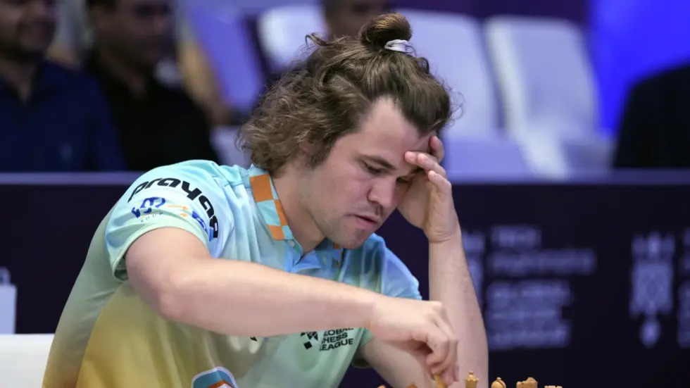 From Controversy To Charity: Chess Grandmaster Who Broke Dress Code Rules With Jeans Now Selling Them For A Cause Norwegian Magnus Carlsen, left, of SG Alpine Warriors plays against Poland’s Jan-Krzysztof Duda of Chingari Gulf Titans during Global Chess League in Dubai United Arab Emirates, on July 1, 2023.