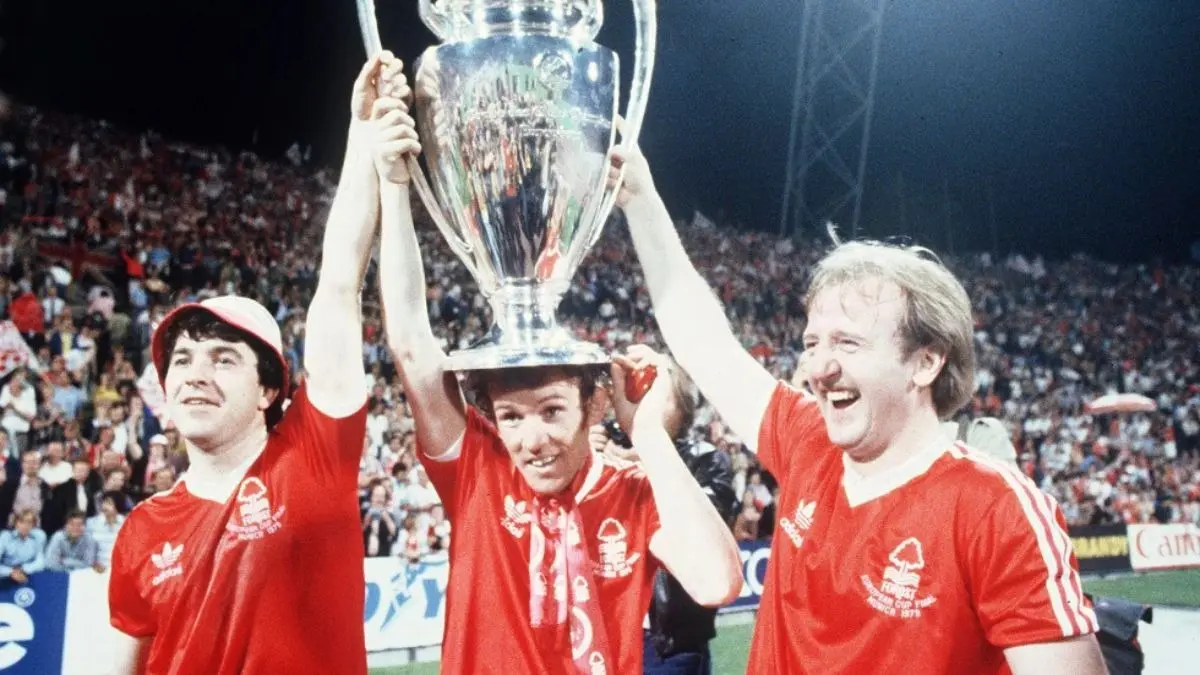 Nottingham Forest’s John Robertson, Ian Bowyer, and Kenny Burns, carry the European Cup in triumph