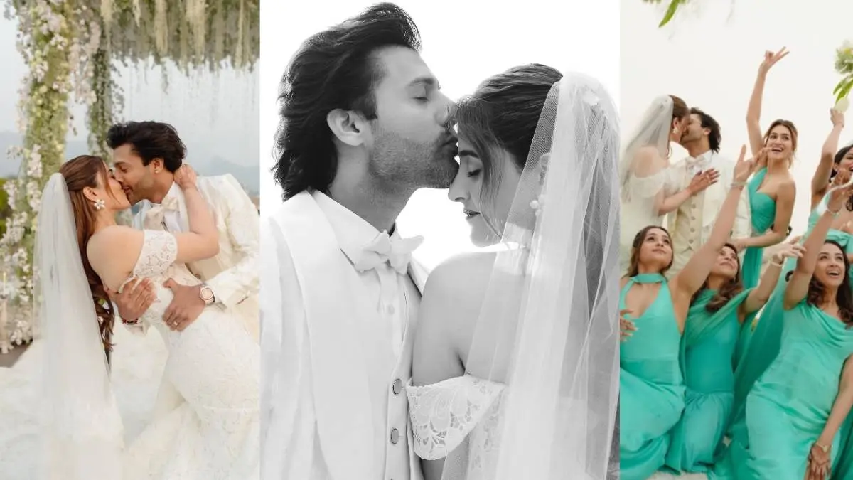Nupur Sanon-Stebin Ben Wedding: ऑफ-शोल्डर गाउन में छाया नूपुर का वेडिंग लुक, स्टेबिन को किया kiss, कृति सेनन का रिएक्शन वायरल Nupur Sanon-Stebin Ben Wedding