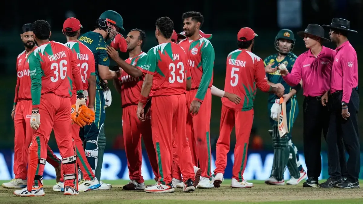 Oman Register Unwanted Record After Getting Crushed By Australia In T20 World Cup 2026 Oman's players congratulate Australia's captain Mitchell Marsh