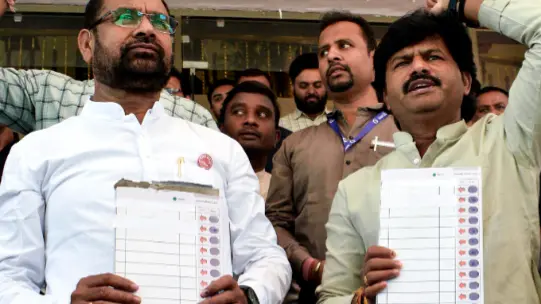 Opposition leaders stage a protest over the EVM issue at Vidhan Bhavan